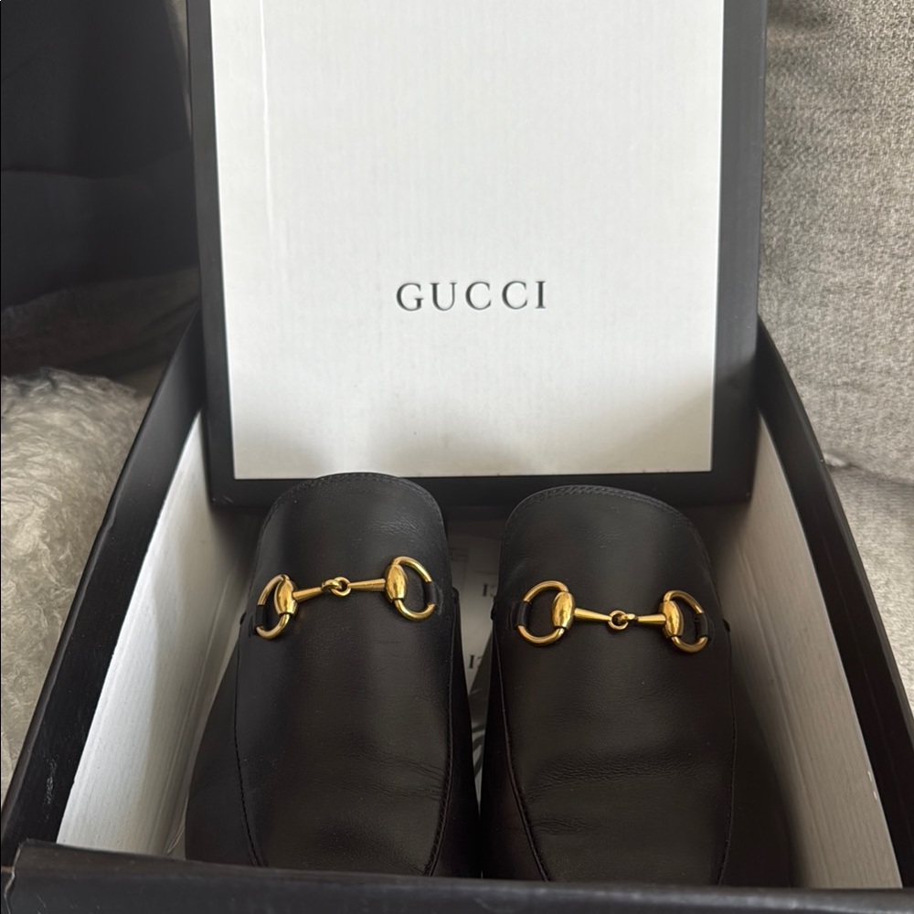 Gucci Black Leather Loafers with Gold Accents